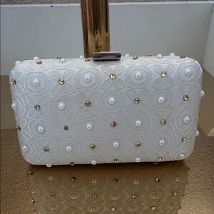 Elegant White Clutch with Pearl and Gold Accents